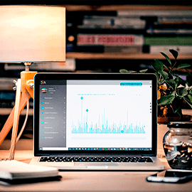 Laptop showing Tillit's data sharing page on table